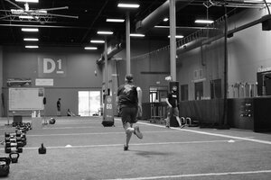 Adult man running in gym in Norwalk - D1 Training Norwalk